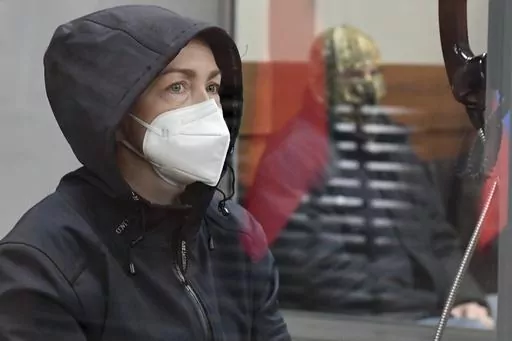 Radio Free Europe-Radio Liberty editor Alsu Kurmasheva sits in a cage in a courtroom in Kazan, Russia, Friday, Oct. 20, 2023. Alsu Kurmasheva is an editor for Radio Free Europe-Radio Liberty. She is the second U.S. journalist to be detained in Russia this year.(Artemii Shumatov/Kommersant Publishing House via AP)