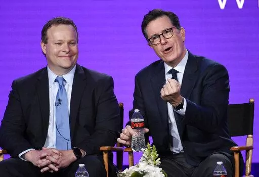 Stephen Colbert, right, executive producer of the Showtime animated series "Our Cartoon President," takes part in a panel discussion on the show with fellow executive producer Chris Licht at the Television Critics Association Winter Press Tour on Jan. 6, 2018, in Pasadena, Calif. Licht, who currently runs Stephen Colbert's late-night show at CBS but has a news background, is expected to be named the new president of CNN. An executive familiar with the discussions who spoke on condition of anonym
