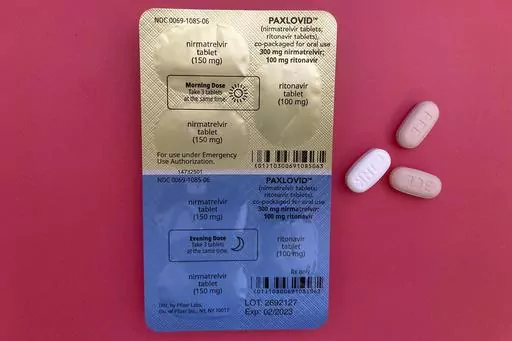 The anti-viral drug Paxlovid is displayed in New York, Monday, Aug. 1, 2022. Pfizer received full approval for the COVID-19 medication on Thursday, May 25, 2023, winning the U.S. Food and Drug Administration's full endorsement for a drug that has been the go-to treatment against the virus for more than two years. (AP Photo/Stephanie Nano, File)