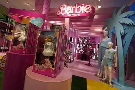 Barbie-themed merchandise is displayed in a special section at Bloomingdale's, in New York, Thursday, July 20, 2023. The "Barbie" movie, parent company Mattel, created a product marketing blitz with more than 100 brands plastering pink everywhere. (AP Photo/Richard Drew, File)