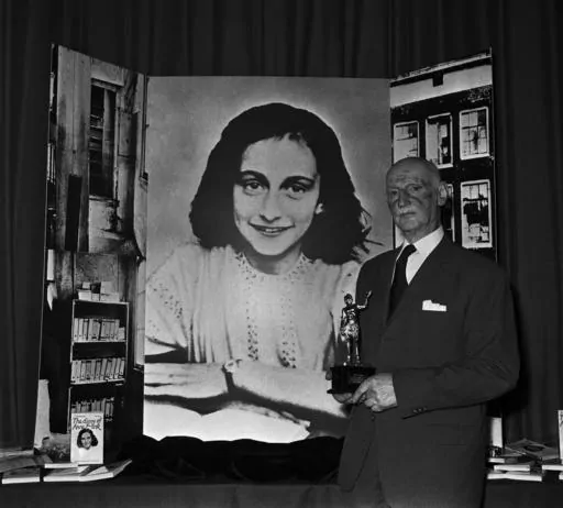 Dr. Otto Frank holds the Golden Pan award, given for the sale of one million copies of the famous paperback, "The Diary of Anne Frank". A high school along Florida’s Atlantic Coast has removed a graphic novel based on the diary of Anne Frank after a leader of a conservative group challenged it, claiming it minimized the Holocaust. “Anne Frank’s Diary: The Graphic Adaptation” was removed from a library at Vero Beach High School after a leader of Moms for Liberty in Indian River County rai