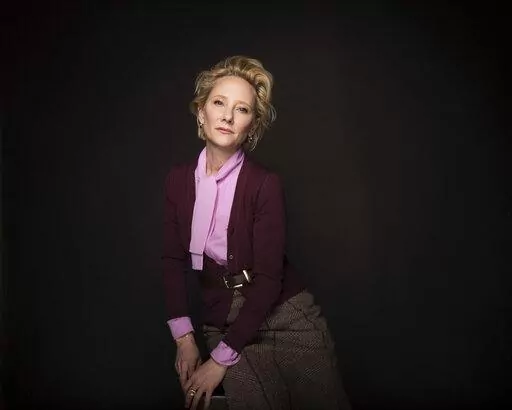 Actress Anne Heche poses for a portrait to promote the film, "The Last Word" during the Sundance Film Festival in Park City, Utah on Jan. 23, 2017.  A spokesperson for  Heche says the actor is on life support after suffering a brain injury in a fiery crash a week ago and isn't expected to survive. The statement released on behalf of her family said she is being kept on life support to determine if she is a viable organ donor. (Photo by Taylor Jewell/Invision/AP, File)