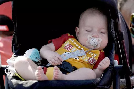 A baby sleeps July 23, 2023, in St. Joseph, Mo. Liam and Olivia have for the fifth year topped the list of top baby names for brand new boys and girls in the U.S., according to the Social Security Administration's list released Friday, May 10, 2024. And Mateo joins the top 10 baby names list for the first time. (AP Photo/Charlie Riedel, File)