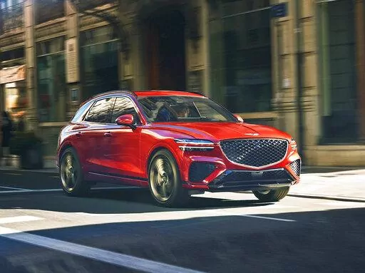 This photo provided by Hyundai shows the 2022 Genesis GV70, the company's first compact luxury SUV. (Courtesy of Hyundai Motor America via AP)