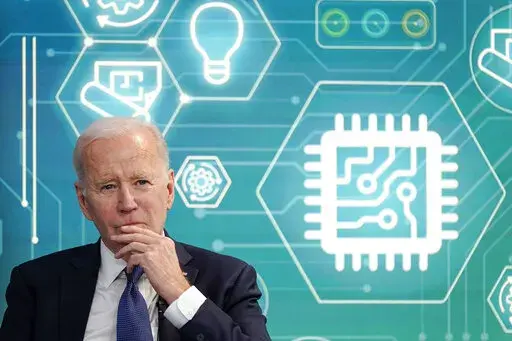 President Joe Biden attends an event to support legislation that would encourage domestic manufacturing and strengthen supply chains for computer chips in the South Court Auditorium on the White House campus, March 9, 2022, in Washington. The Biden administration’s recent move to block exports of advanced computer chips to China signals a new phase in relations between the globe’s two largest economies. (AP Photo/Patrick Semansky, File)