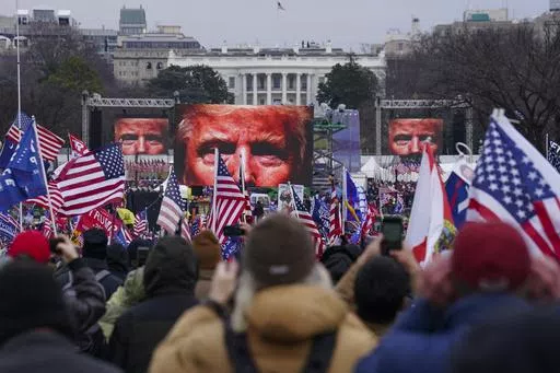 Supporters of Donald Trump participate in a rally in Washington, Jan. 6, 2021. The Supreme Court is hearing arguments Tuesday, April 16, 2024, over the charge of obstruction of an official proceeding that has been brought against 330 people, according to the Justice Department. The charge refers to the disruption of Congress' certification of Joe Biden's 2020 presidential election victory over former President Trump. Trump faces two obstruction charges. Next week, the justices will weigh whether