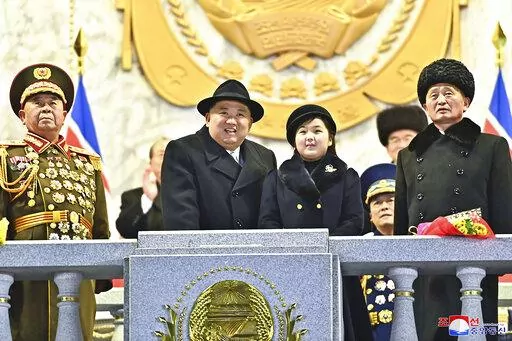 In this photo provided by the North Korean government, North Korean leader Kim Jong Un, center left, with his daughter attends a military parade to mark the 75th founding anniversary of the Korean People’s Army on Kim Il Sung Square in Pyongyang, North Korea Wednesday, Feb. 8, 2023. Independent journalists were not given access to cover the event depicted in this image distributed by the North Korean government. The content of this image is as provided and cannot be independently verified. Kor