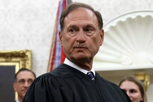 Supreme Court Justice Samuel Alito pauses after swearing in Mark Esper as Secretary of Defense during a ceremony with President Donald Trump in the Oval Office at the White House in Washington, July 23, 2019. Nine days after The New York Times reported about the political symbolism of an upside-down American flag that flew at U.S. Supreme Court Justice Samuel Alito's home, the Washington Post acknowledged May 25, 2024, that it had the same story more than three years ago and decided not to publi