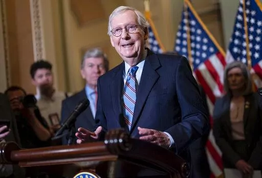 Senate Minority Leader Mitch McConnell, R-Ky., speaks with reporters following a closed-door policy lunch, at the Capitol in Washington, June 14, 2022. McConnell set the strategy to confirm conservative judges, and transform the federal judiciary in motion, engineering the Supreme Court's makeover by blocking President Barack Obama's nomination of Merrick Garland and changing the Senate's rules to easily confirm Trump's picks. (AP Photo/J. Scott Applewhite, File)