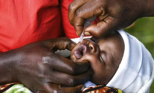 A baby receives a polio vaccine during the Malawi Polio Vaccination Campaign Launch in Lilongwe, Malawi, on March 20, 2022. In neighbouring Mozambique, health authorities declared Wednesday May 18, 2022, an outbreak of wild poliovirus after confirming that a child in the country's northeastern Tete province had contracted the disease. (AP Photo/Thoko Chikondi, File)