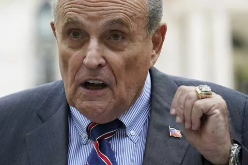 Former New York City Mayor Rudy Giuliani speaks during a news conference, Tuesday, June 7, 2022, in New York. In a legal complaint filed in New York, Monday, May 15, 2023, a woman who says she worked as an off-the-books employee for Giuliani during his stint as Donald Trump’s personal lawyer alleges that the former New York City mayor coerced her into sex and owes her nearly $2 million in unpaid wages. (AP Photo/Mary Altaffer, File)