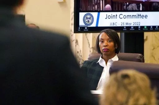 Rep. Angela Cockerham, I-Magnolia, listens as Mississippi's revenue estimate is discussed during a meeting of the Joint Legislative Budget Committee, Friday, March 25, 2022, at the Capitol in Jackson, Miss. (AP Photo/Rogelio V. Solis)