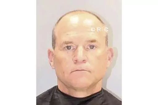 This undated mugshot provided by the Richland County Detention Center shows Cory Fleming. The longtime friend of convicted murderer Alex Murdaugh admitted Thursday, May 25, 2023, that he helped his old college roommate steal more than $4 million meant for a wrongful death settlement after Murdaugh's housekeeper died in a fall. (Richland County Detention Center via AP)