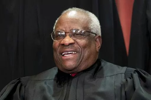 In this Nov. 30, 2018 photo, Supreme Court Associate Justice Clarence Thomas sits for a group portrait at the Supreme Court Building in Washington. Justice Thomas participated at a "fireside" chat in Salt Lake City hosted by former Sen. Orrin Hatch's foundation, Friday, March 11, 2022. (AP Photo/J. Scott Applewhite, File)