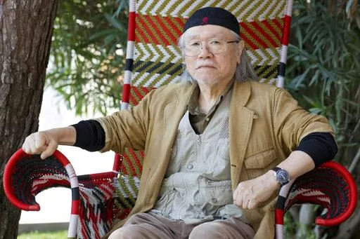 Manga artist Leiji Matsumoto poses for portraits at the 70th edition of the Venice Film Festival held from Aug. 28 through Sept. 7, in Venice, Italy, on Sept. 3, 2013. Matsumoto died of acute heart failure in a Tokyo hospital on Feb. 13, 2023, his office, Studio Leijisha, said Monday, Feb. 20, 2023. (AP Photo/Domenico Stinellis, File)