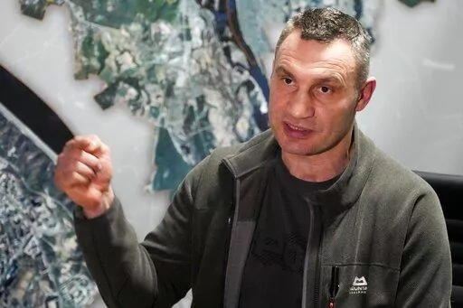Vitali Klitschko, Kyiv Mayor and former heavyweight champion gestures while speaking during his interview with the Associated Press in his office in the City Hall in Kyiv, Ukraine, Sunday, Feb. 27, 2022. A Ukrainian official says street fighting has broken out in Ukraine's second-largest city of Kharkiv. Russian troops also put increasing pressure on strategic ports in the country's south following a wave of attacks on airfields and fuel facilities elsewhere that appeared to mark a new phase of 