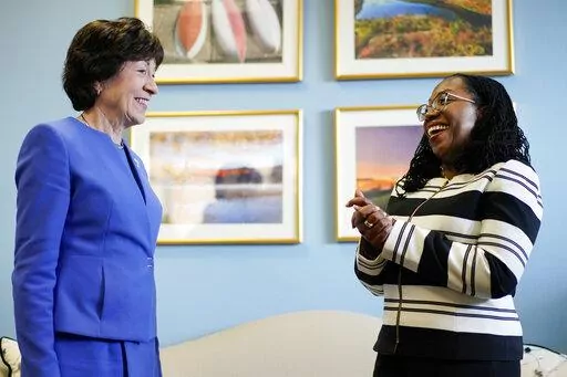 Supreme Court nominee Ketanji Brown Jackson meets with Sen. Susan Collins, R-Maine, on Capitol Hill in Washington, March 8, 2022.  Collins will vote to confirm Ketanji Brown Jackson, giving Democrats at least one Republican vote and all but assuring that she will become the first Black woman on the Supreme Court. (AP Photo/Carolyn Kaster, File)
