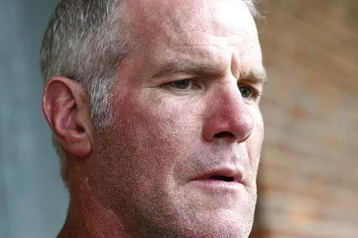 Former NFL quarterback Brett Favre speaks to the media in Jackson, Miss., Oct. 17, 2018. The governor of Mississippi in 2017 was “on board” with a plan for a nonprofit group to pay Brett Favre more than $1 million in welfare grant money so the retired NFL quarterback could help fund a university volleyball facility, according to a text messages between Favre and the director of the nonprofit in court documents filed Monday, Sept. 12, 2022. (AP Photo/Rogelio V. Solis, File)