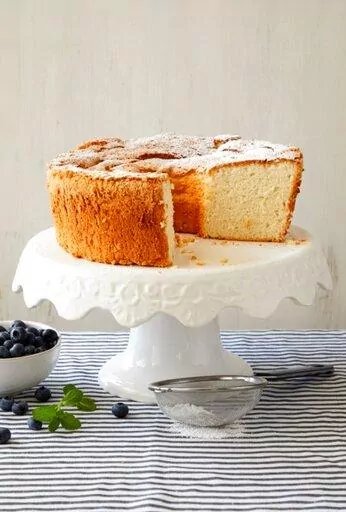 This image released by Harper Horizon shows a recipe for angel food cake from the cookbook "The Fresh Eggs Daily Cookbook" by Lisa Steele. (Tina Rupp/Harper Horizon via AP)
