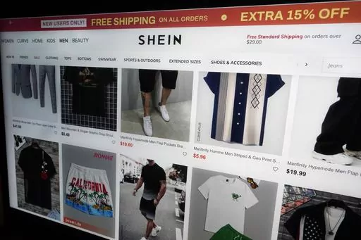 A page from the Shein website is shown in this photo, in New York, Friday, June 23, 2023. China's fast fashion retailer Shein is facing a lawsuit that claims the company is infringing on copyrights in a way that amounts to racketeering. (AP Photo/Richard Drew)