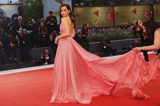 Ana de Armas poses for photographers upon arrival at the premiere of the film 'Blonde' during the 79th edition of the Venice Film Festival in Venice, Italy, Thursday, Sept. 8, 2022. (Photo by Joel C Ryan/Invision/AP)